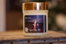 Load image into Gallery viewer, &quot;Starry Christmas Eve&quot; Label on a 10oz soy candle with wooden wick and a metallic lid