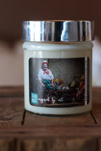 Load image into Gallery viewer, &quot;The lonely clown,&quot; art by Shanna Koltz on a Soy candle with crackling wooden wick in a 10oz Glass Jar with a shiny lid