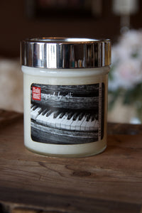 "The love of music," art by Shanna Koltz on a Soy candle with crackling wooden wick in a 10oz Glass Jar with a shiny lid